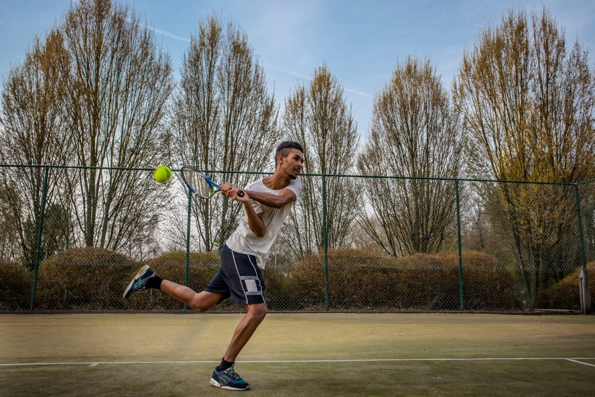 Playing tennis using backhand